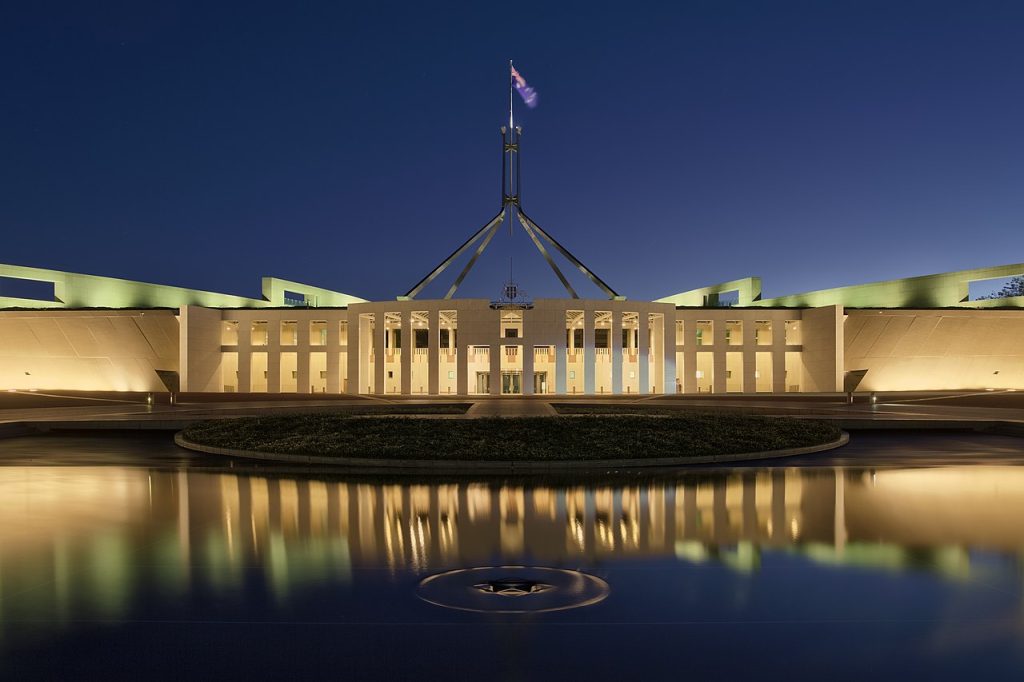 Australian Parliament House at dusk, Wikimedia commons: Thennicke, CC BY SA 4.0